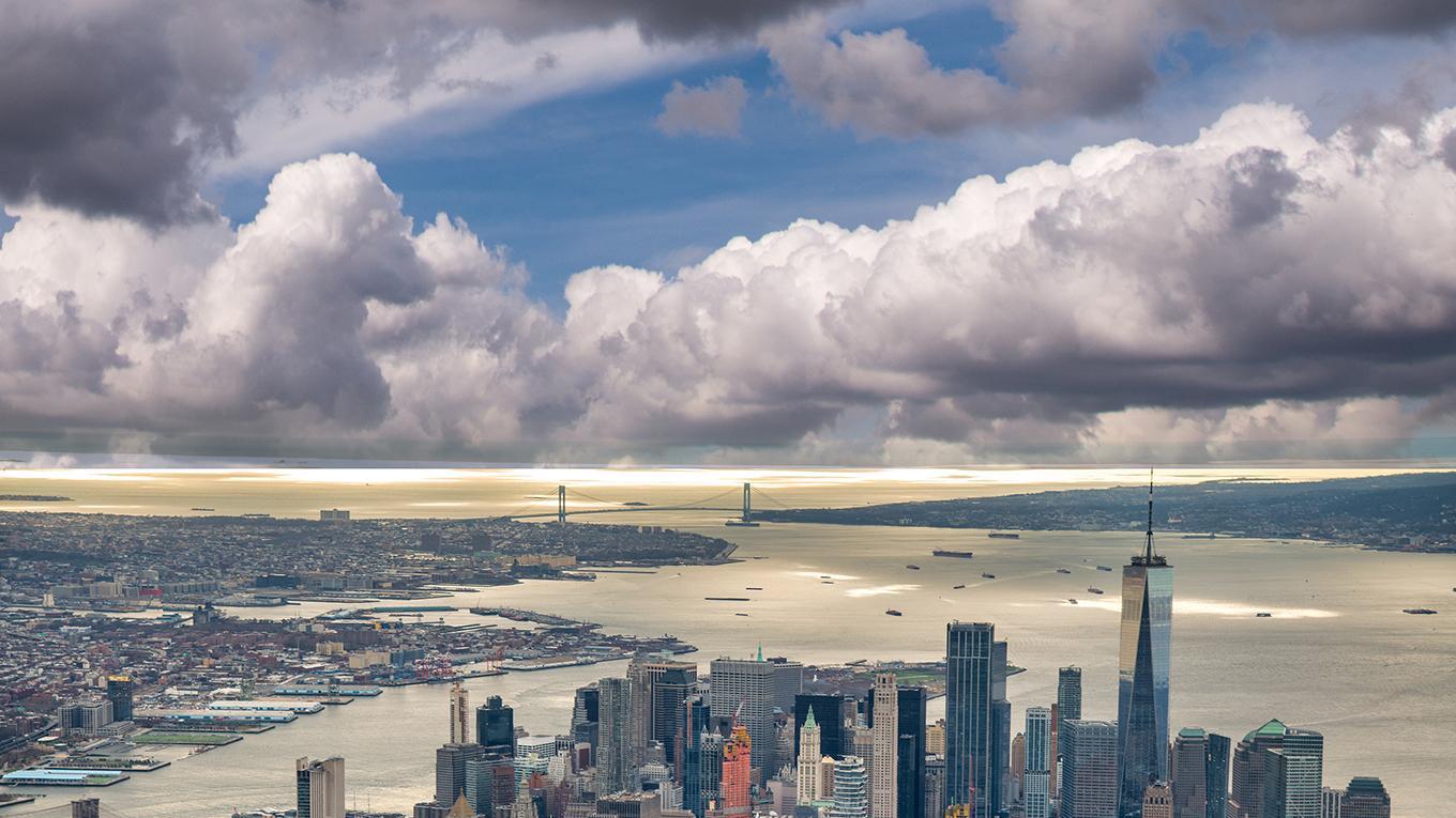 Streets and buildings of Downtown Manhattan and Verrazzano Bridge, aerial view from helicopter at dusk.; Shutterstock ID 1910114401; purchase_order: Nathalie Parry PFAS